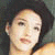 Static pixelated image of a person with dark hair and light skin, cropped to show head and shoulders against a muted background.