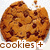 A pixelated chocolate chip cookie with a bite taken out, next to spilled milk and a glass on blue background, below a smiling cartoon rabbit with 'Happy!' text.