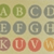 A grid of circular icons with letters A through W, each in a distinct color on a light background.