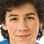 A person with curly brown hair and a blue shirt appears in three showing subtle facial expression changes