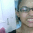 Pixelated static image shows a person with glasses and light brown hair against a bright background, partially cropped on the right.