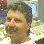 Four pixelated views of a person's head and shoulders in different poses against a light background with blue and brown accents.