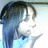 Pixelated anime-style icon of a person with long dark hair and light skin, wearing blue clothing against a pale background.