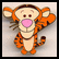 Pixelated cartoon tiger character with orange and brown stripes, pink nose, raised arms, and a neutral expression on light gray background.