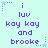 Light cyan background with purple pixelated text reading "i luv kay kay and brooke" arranged in two , surrounded by blue star-shaped decorations