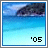 '05 text appears in bottom-right corner of two identical beach scenes with blue water and dark rocky cliffs under a light sky.