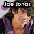 Animated sequence showing Joe Jonas, a black cross, Alexa Motta, and 'Mr. & Mrs. Jonas' text over a pink heart.