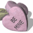nine identical heart-shaped candy icons with 'BE MINE' text, each featuring a pink surface and purple shadow