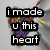A pixelated image shows text reading "i made u this heart" over a colorful, abstract background with scattered shapes.