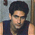A contact sheet of two animated frames showing a person in a sleeveless shirt on the left and green text reading "Original Icons .com" on the right against a dark background.