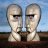Two identical pixelated busts of a person with short light hair, dark eyes, and neutral expression against blue sky background.