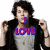 A person with dark curly hair wears a gray shirt and black jacket, holding both hands up near shoulders in two ; the third shows text overlays changing from "I LOVE" to "NICK JONAS"