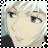 Pixelated close-up of a character's face with light-colored hair, dark eyes, and neutral expression against a soft background.