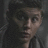 A pixelated image of a person with dark hair and a neutral expression, next to text reading "Dean from Supernatural" on a dark blue background.