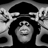 A black-and-white animated contact sheet of Jay-Z's album cover featuring repeated text and mirrored facial features with ornate decorative elements.