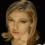 Four of a pixelated animated image showing a person with light brown hair against black background, displaying changing facial expressions and head positions