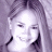 A 48x48 pixel buddy icon split into two sections: a grayscale portrait of a smiling woman on the left and green text reading "Original Icons .com" on a dark green background on the right.