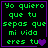 Green pixelated text on black background with purple border, displaying Spanish lyrics and a heart symbol that changes from solid to outlined.