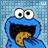 Blue cartoon character with large white eyes and black pupils, open mouth showing dark interior, yellow tongue with brown spots, pixelated blue background.