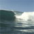 Animated contact sheet showing three sequential frames of a surfer riding a large ocean wave under clear blue sky.