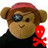 Pixelated cartoon monkey wearing red cap and dark clothing, holding a small red skull-and-crossbones symbol.
