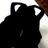 Black cat silhouette with white inner ears and a small gray mark on its face, set against a light background with orange text elements.