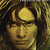 Pixelated portrait of a person with long brown hair and a neutral expression, displayed in a with visible pixelation and color banding