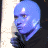 Blue-skinned character with glowing white spot on forehead holding orange stick-like object against dark background in animated contact sheet frame