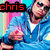 A pixelated image of a person in a blue hoodie with red text 'chris brown' above and '<3' on the left, set against a colorful striped background.