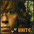 pixelated images showing a person with brown hair and green foliage background, each containing text 'WHITE.' or partial variants below the face