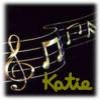 A static icon featuring a musical staff with a treble clef and notes, and the name 'Katie' in yellow script on a dark background.