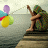Pixelated static image shows a figure sitting on a ledge by water, holding colorful balloons with one hand raised.