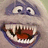 Pixelated cartoon face with wide eyes and a large open mouth showing teeth, next to pixelated text reading "BUMBLE BOUNCE" on light background.