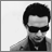 Animated contact sheet of a man in sunglasses and suit with background figures, ending in a "dm" logo icon.