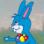 Blue cartoon rabbit with pink inner ears and nose, white mouth area, red and yellow chest emblem, extended arm, pixelated background.