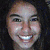 A two- animated image shows a person with long dark hair smiling, transitioning from color to grayscale, over purple spiral backgrounds with text