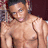 A pixelated image of a shirtless person with dark hair against a dark background, next to red text reading ELENI + SOULJA BOY.