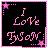 Pixelated icon with pink text reading "I Love Taylor" on dark background, bordered by pink and white pixelated frame elements.