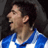 Pixelated static image of a person in profile wearing a blue and white striped shirt against dark background.