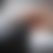 A pixelated gradient image with no distinct subjects or text, showing smooth transitions between gray and brown tones.