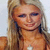 A pixelated image of a woman with blonde hair and blue eyes next to text reading "Thats Hot" in black and pink fonts on a white background.