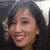 A four- shows a person with long dark hair smiling in different poses, with a blue text overlay in the top-right