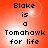 Red background with pixelated text reading 'Blake is a Tomahawk for life' in four identical arranged in a