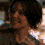 A pixelated image of a person with dark hair in four repeated showing slight variations in head position and lighting