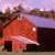 A split-screen image with a barn photo on the left and pink text on cyan background reading "Yes... I was raised in a barn... Got a prob?".