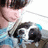 Pixelated image of a person holding a small dog with black and white fur, next to text reading "I Am Jillian Michelle Reinhart" and "I Am Everything I Want To Be" with heart symbols.