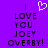 Purple background with black pixelated text reading 'I LOVE YOU JOEY OVERBY!' and a white pixelated heart symbol above the text.