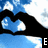 Animated sequence showing a black silhouette of hands forming a heart shape against a blue sky with white clouds, with text changing from 'E' to 'Ellen P5' across frames.