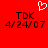Red background with two identical pixelated text blocks reading "TDK 4/24/07" and a white heart symbol above them.