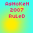 Pixelated text 'AsHoKeN 2007 RuLeD' on a cyan-to-yellow gradient background with four distinct yellow circular highlights.